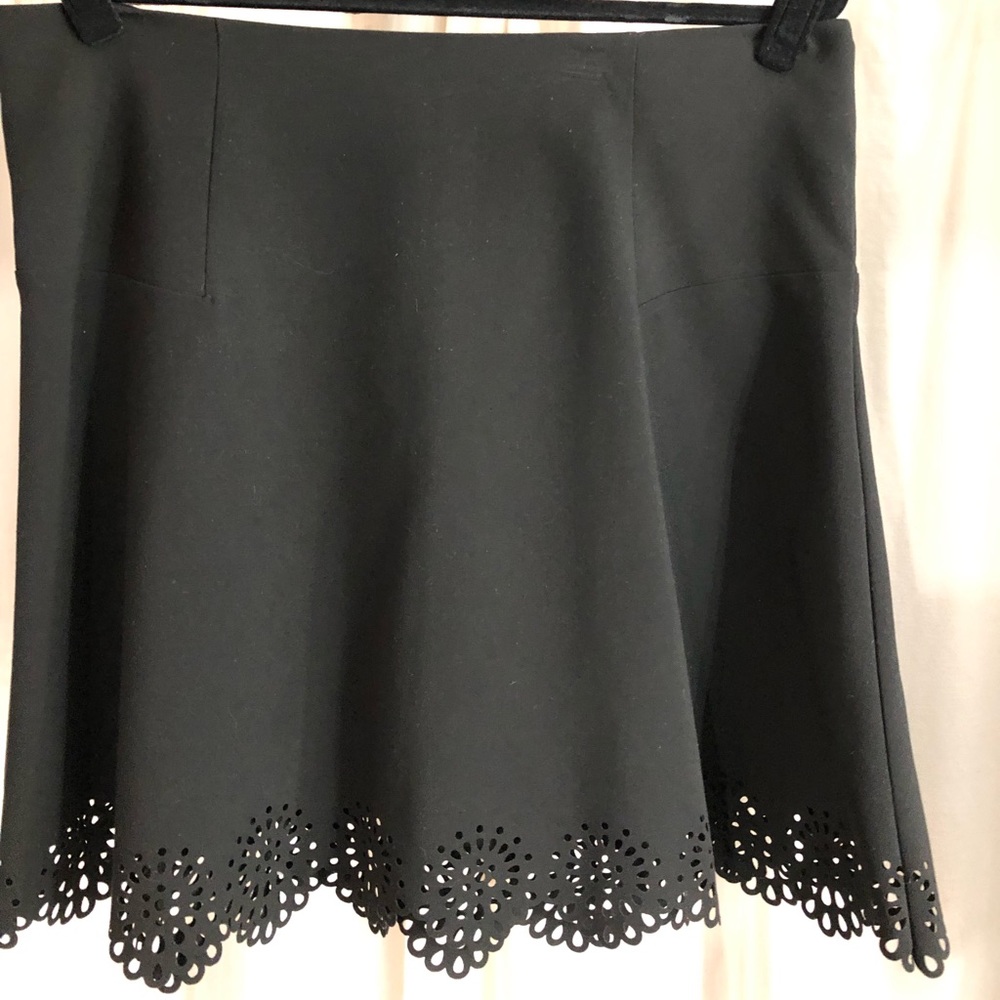 Black skirt with floral cutouts